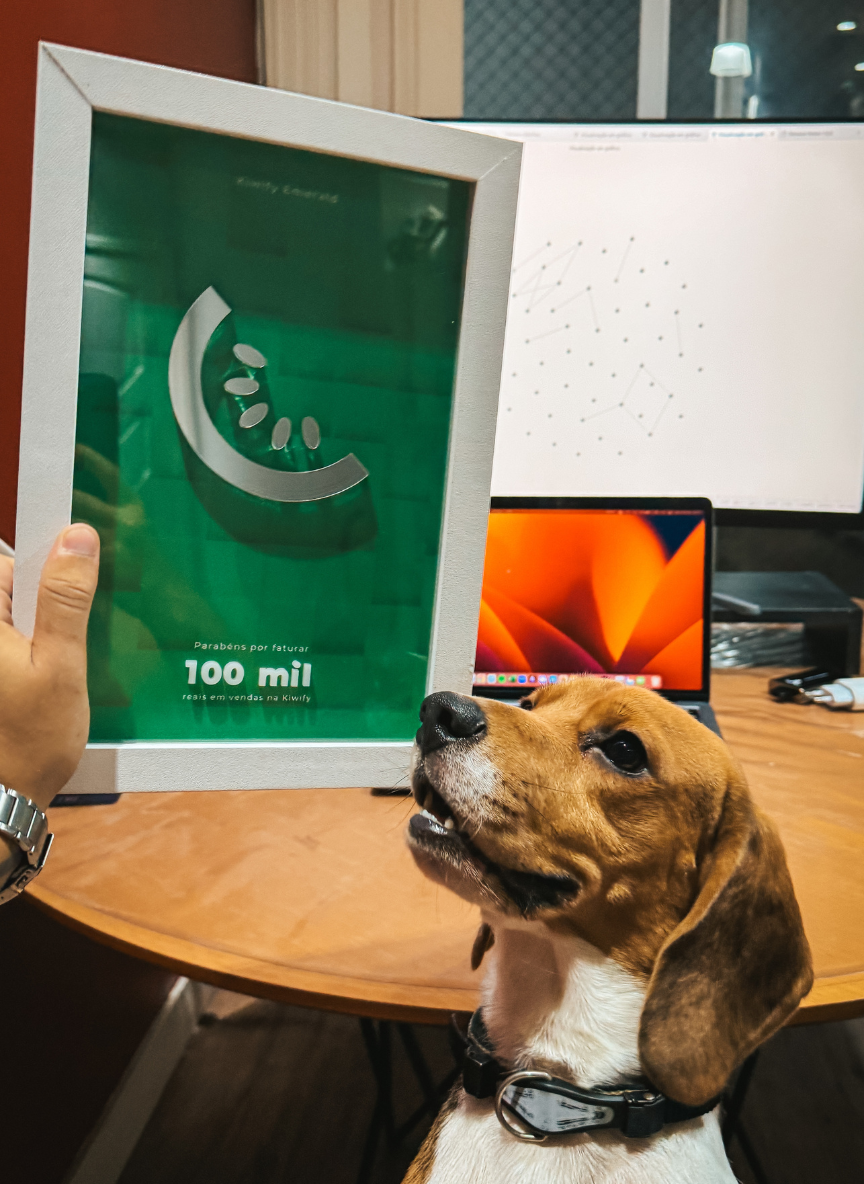 100 mil achievement plaque with beagle dog in office setting